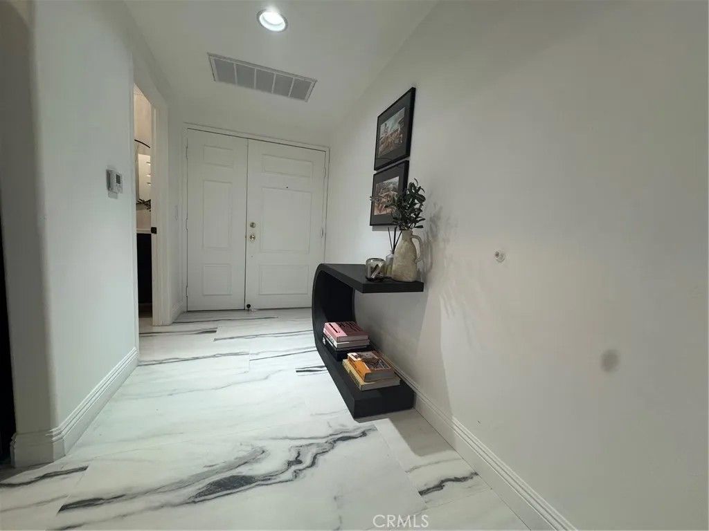 Photo of 12011 Goshen Ave #104, Los Angeles, CA 90049 (MLS # BB26043336)