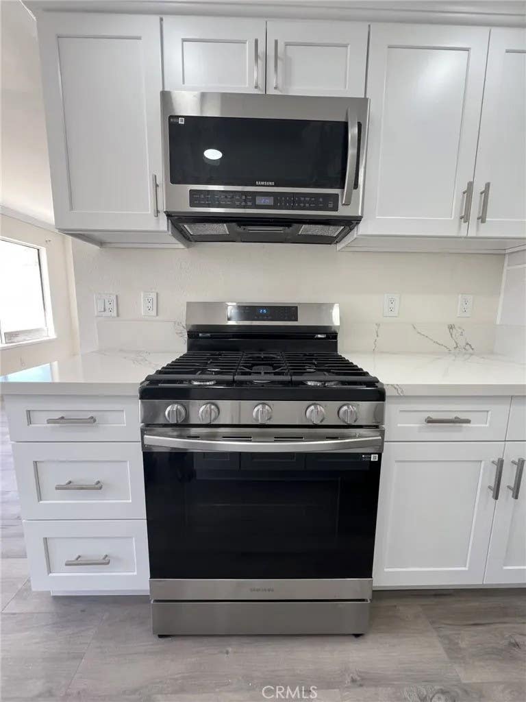 Photo of 12545 Cuesta DR, Cerritos, CA 90703 (MLS # DW26165047)