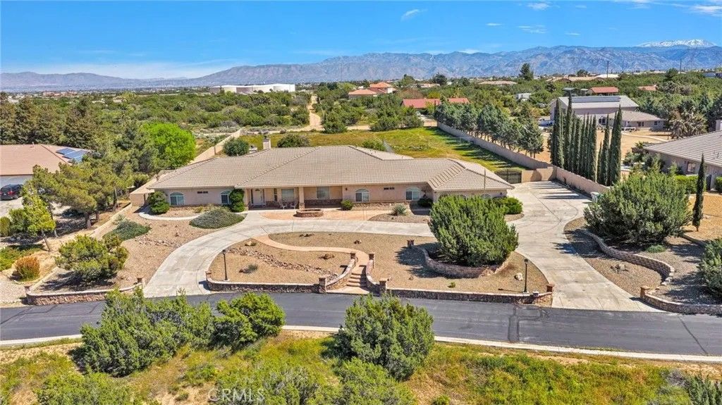 Photo of 7091 Coriander Trl, Oak Hills, CA 92344 (MLS # HD26063570)