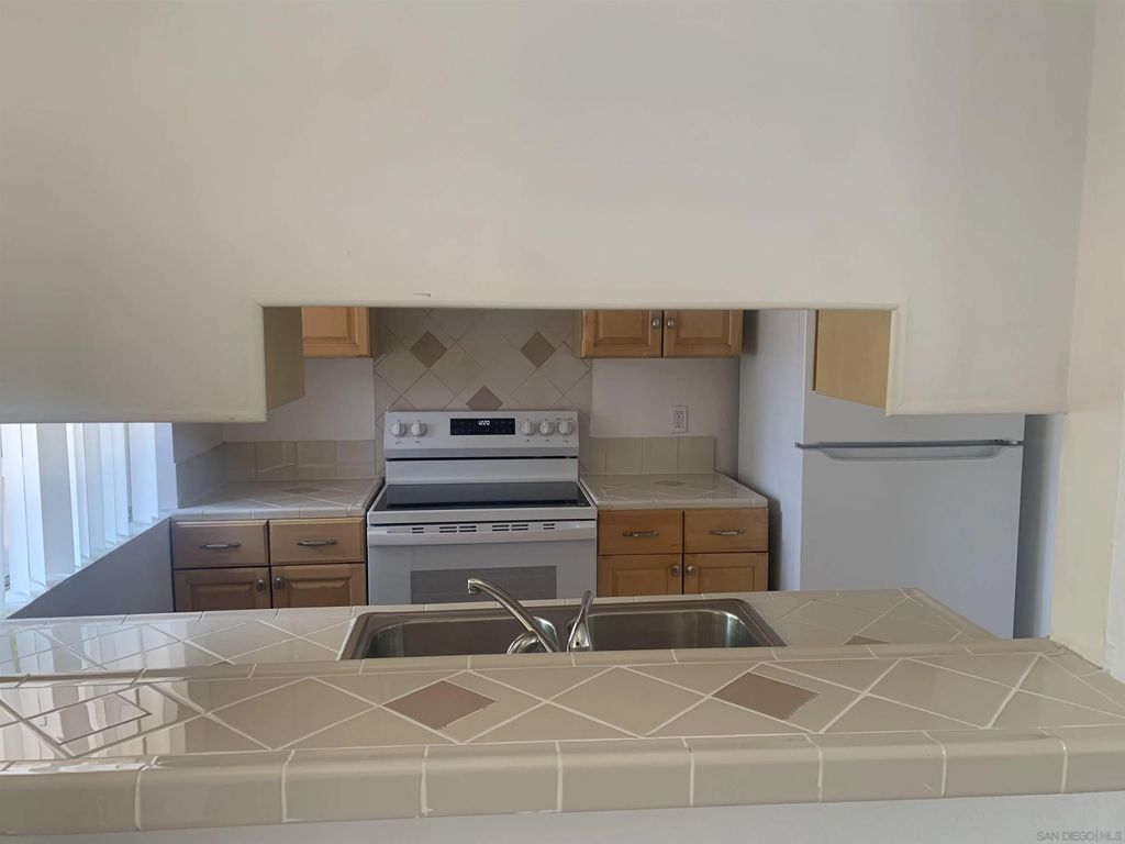 Photo of 1524 Gustavo St #D, El Cajon, CA 92019 (MLS # 250041601)