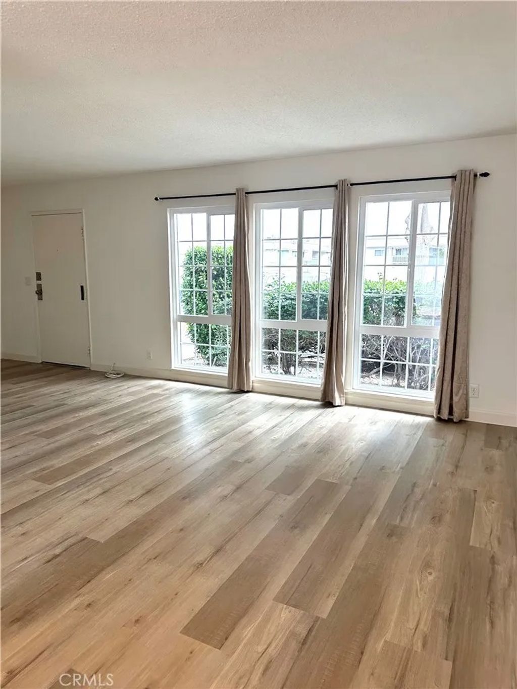 Photo of 1955 W Greenleaf Avenue #E, Anaheim, CA 92801 (MLS # AR26077243)