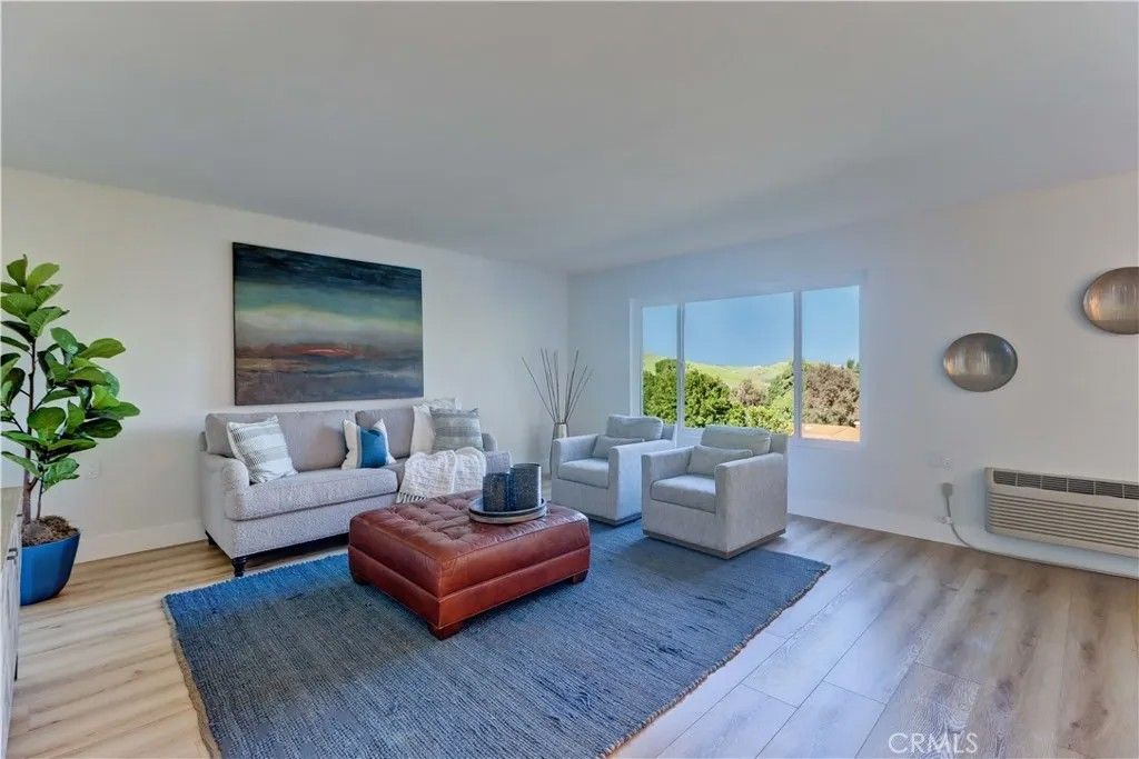 Photo of 5369 Algarrobo #2D, Laguna Woods, CA 92637 (MLS # OC26006176)