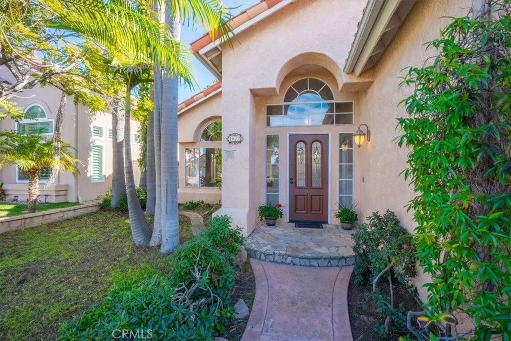 Photo of 1672 Olympus Loop, Vista, CA 92081 (MLS # OC26010676)