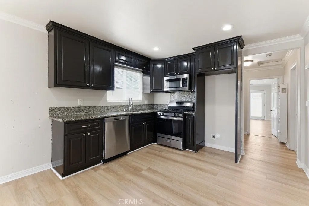 Photo of 1221 W 73rd Street, Los Angeles, CA 90044 (MLS # OC26111983)