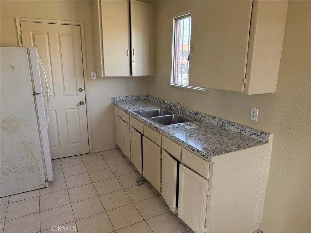 Photo of 7819 S Hoover St, Los Angeles, CA 90044 (MLS # SR26095969)