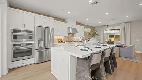 Photo of 27393 Fox Den Place, Valencia, CA 91381 (MLS # OC26055722)