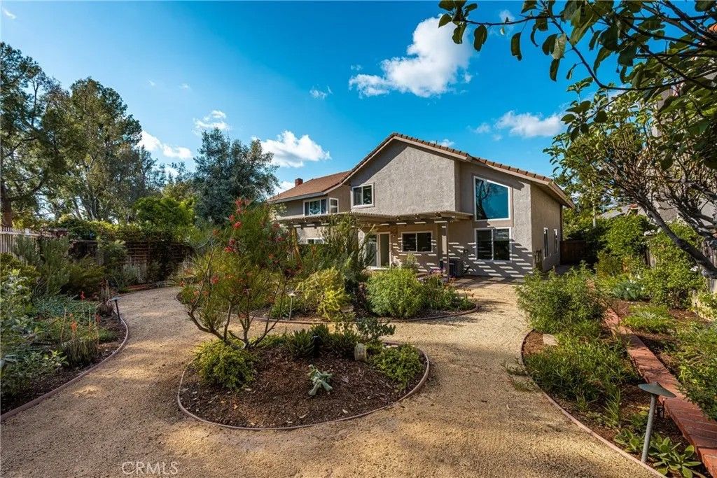 Photo of 8216 E Flowerwood Avenue, Orange, CA 92869 (MLS # OC26068834)