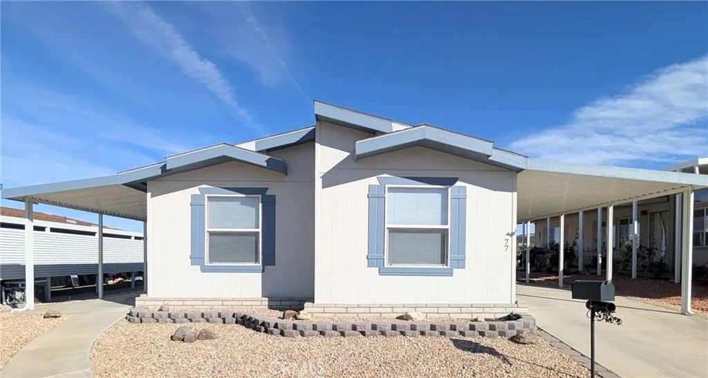 Photo of 7501 Palm Unit 77 Ave, Yucca Valley, CA 92284 (MLS # JT26047041)