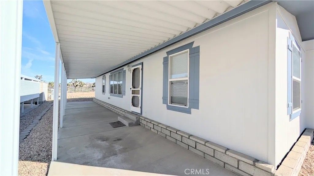 Photo of 7501 Palm Unit 77 Ave, Yucca Valley, CA 92284 (MLS # JT26047041)