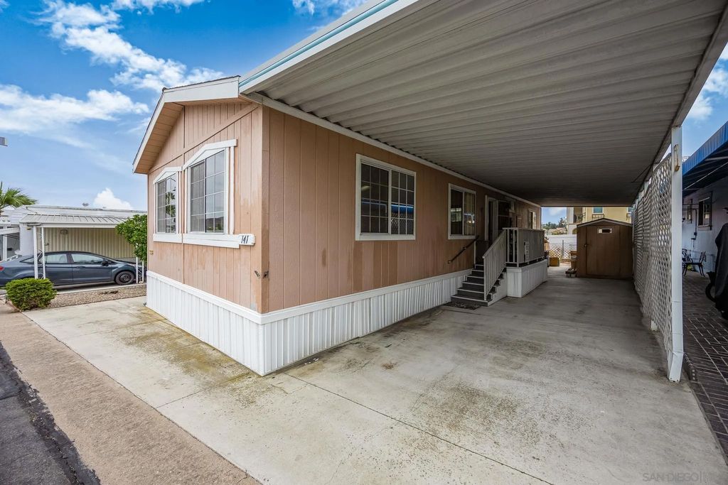 Photo of 8545 Mission Gorge Rd #SPC 141, Santee, CA 92071 (MLS # 250040625)