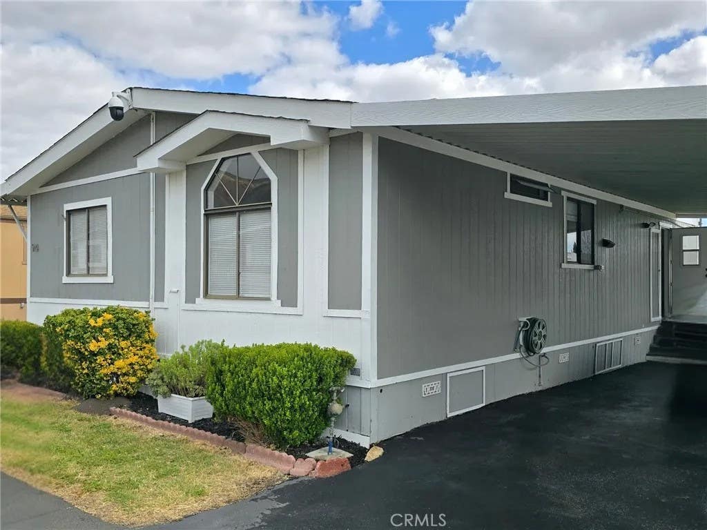 Photo of 32900 Riverside Dr #94, Lake Elsinore, CA 92530 (MLS # IV26094944)
