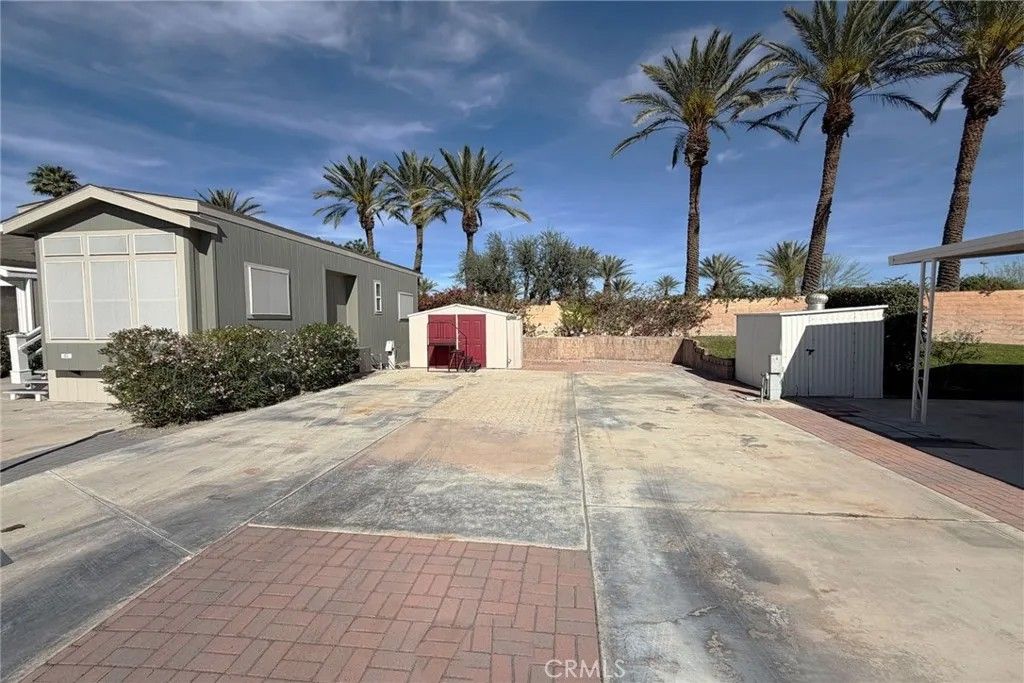 Photo of 69801 Ramon Rd, Cathedral City, CA 92234 (MLS # OC26044499)