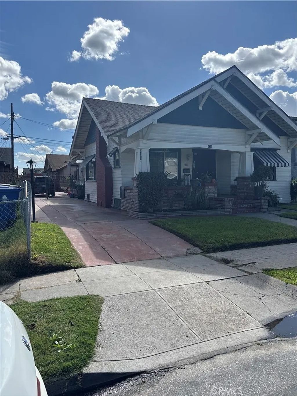 Photo of 426 W 51st St, Los Angeles, CA 90037 (MLS # DW26038083)