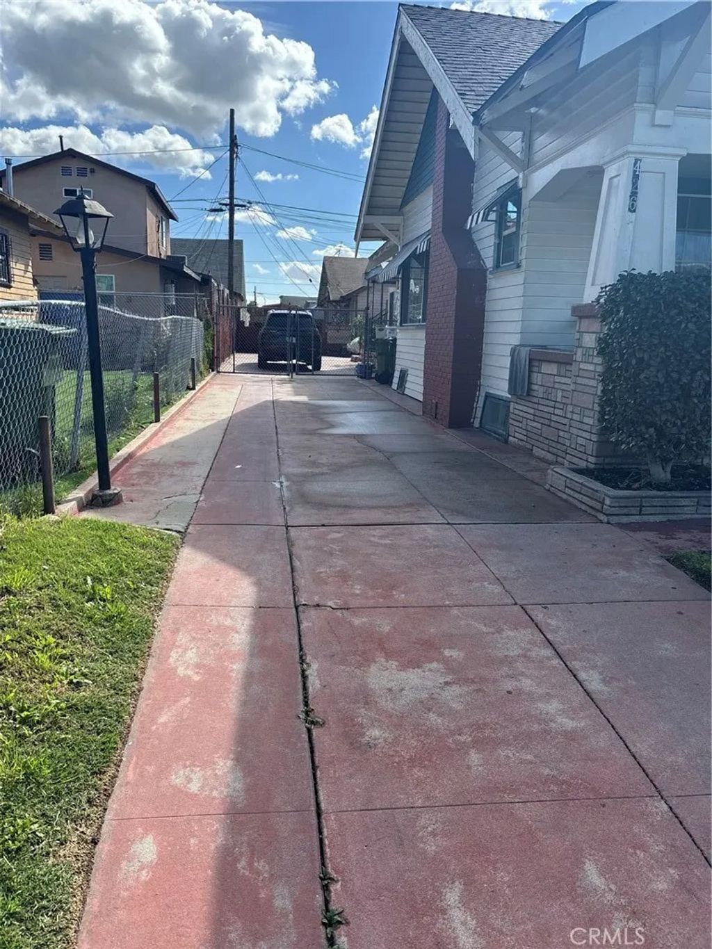 Photo of 426 W 51st St, Los Angeles, CA 90037 (MLS # DW26038083)