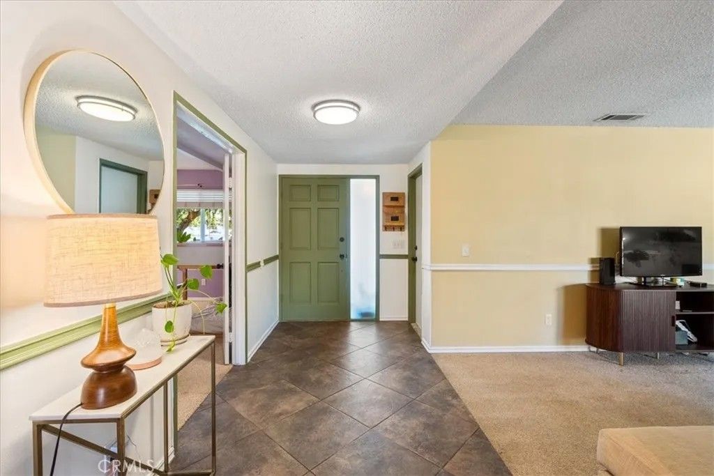 Photo of 1668 Kenora Dr, Escondido, CA 92027 (MLS # OC26077000)