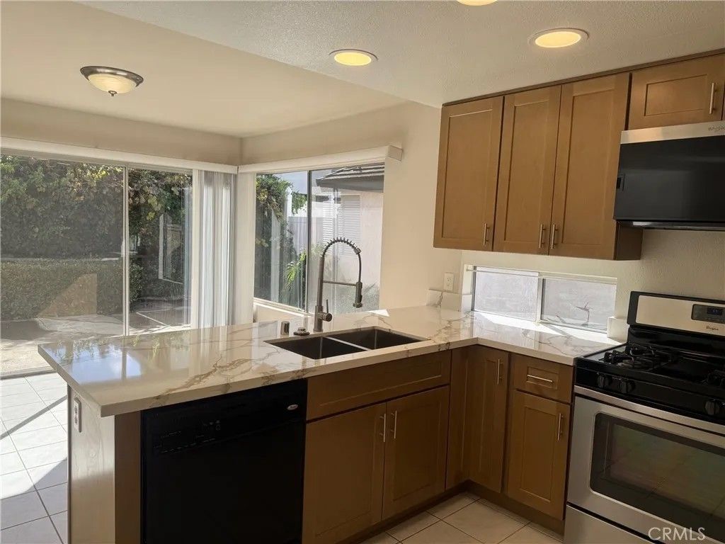 Photo of 12 Brookdale, Irvine, CA 92604 (MLS # OC26000556)