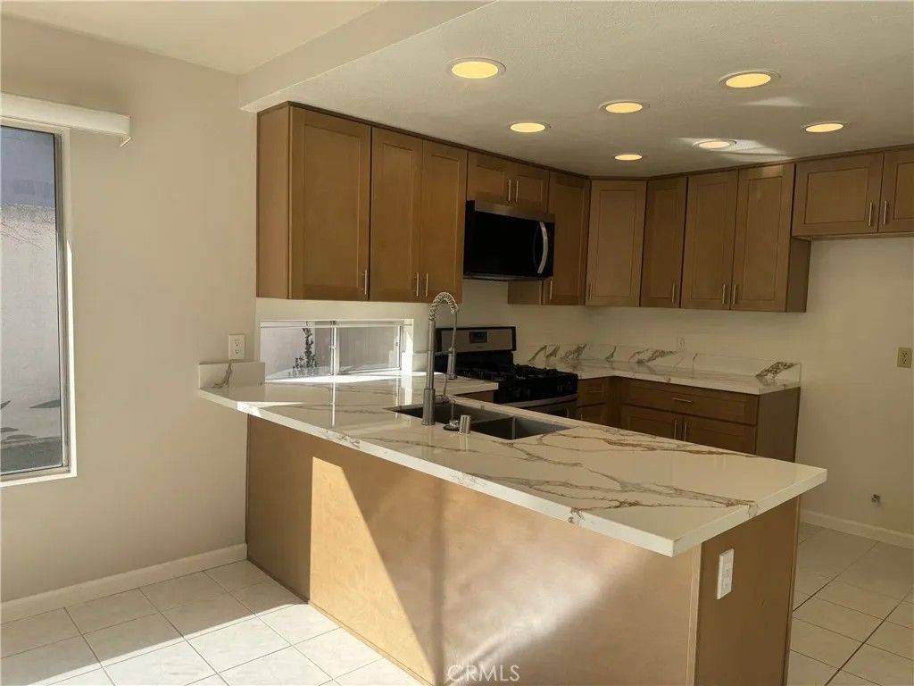 Photo of 12 Brookdale, Irvine, CA 92604 (MLS # OC26000556)