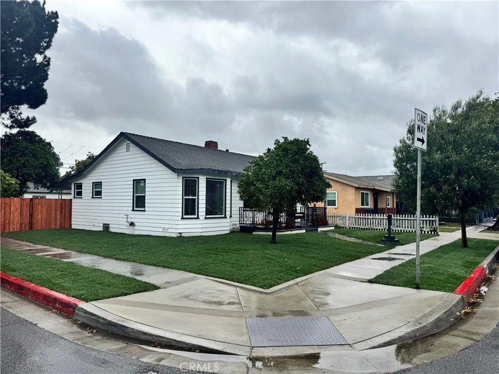 Photo of 6556 San Vincente St, Paramount, CA 90723 (MLS # PW26037981)