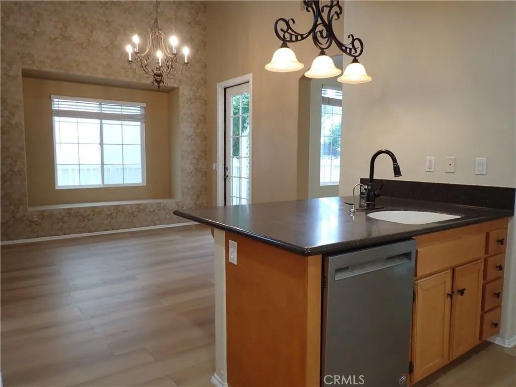 Photo of 55 Essex Ln, Irvine, CA 92620 (MLS # OC25277884)