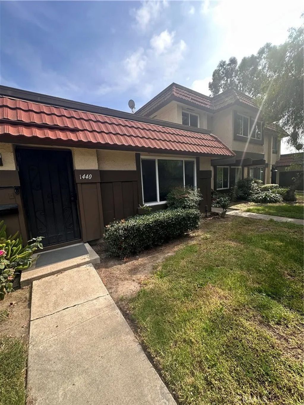 Photo of 1440 N Weeping Willow Ln, Anaheim, CA 92801 (MLS # RS25255614)