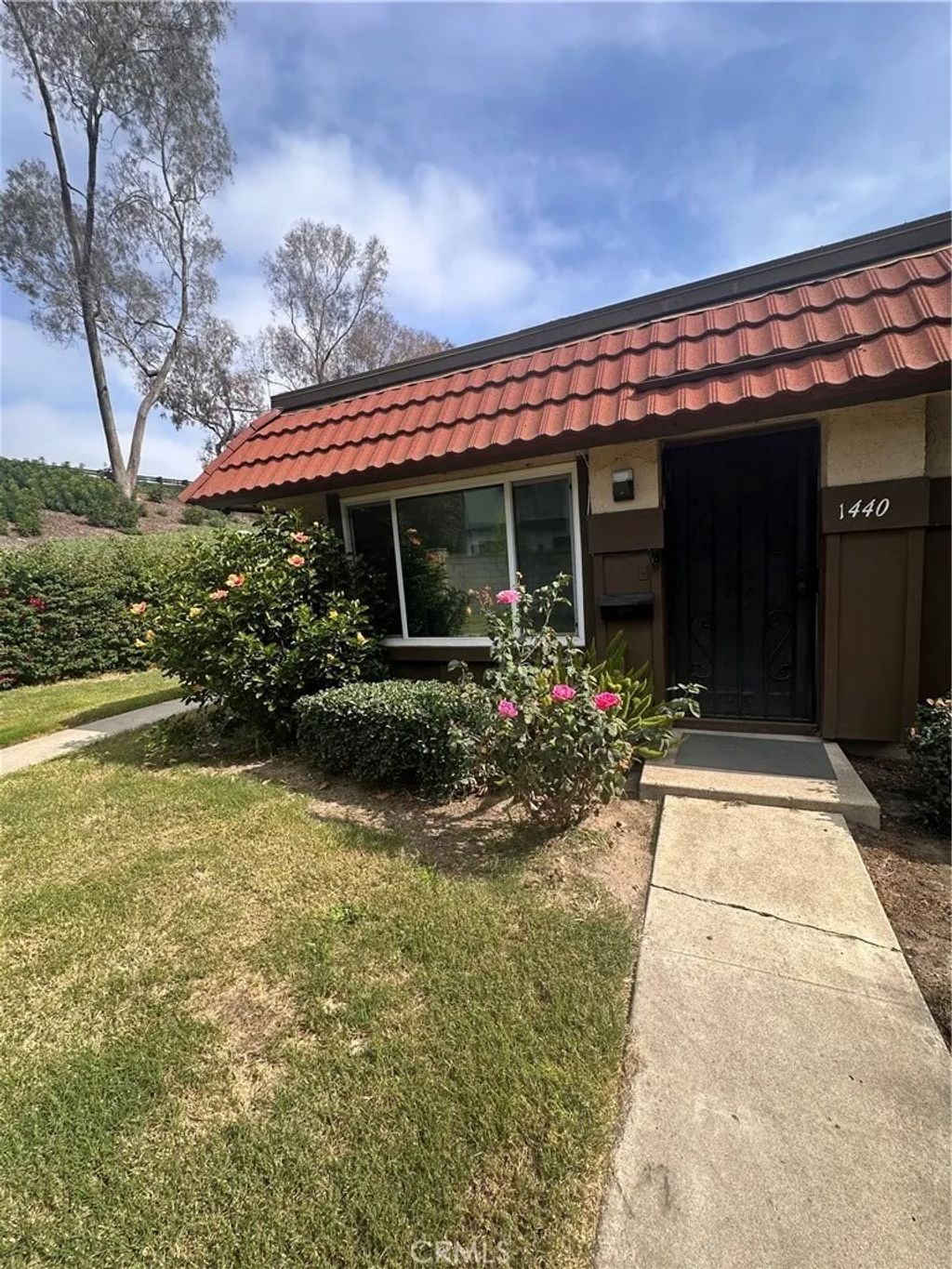 Photo of 1440 N Weeping Willow Ln, Anaheim, CA 92801 (MLS # RS25255614)