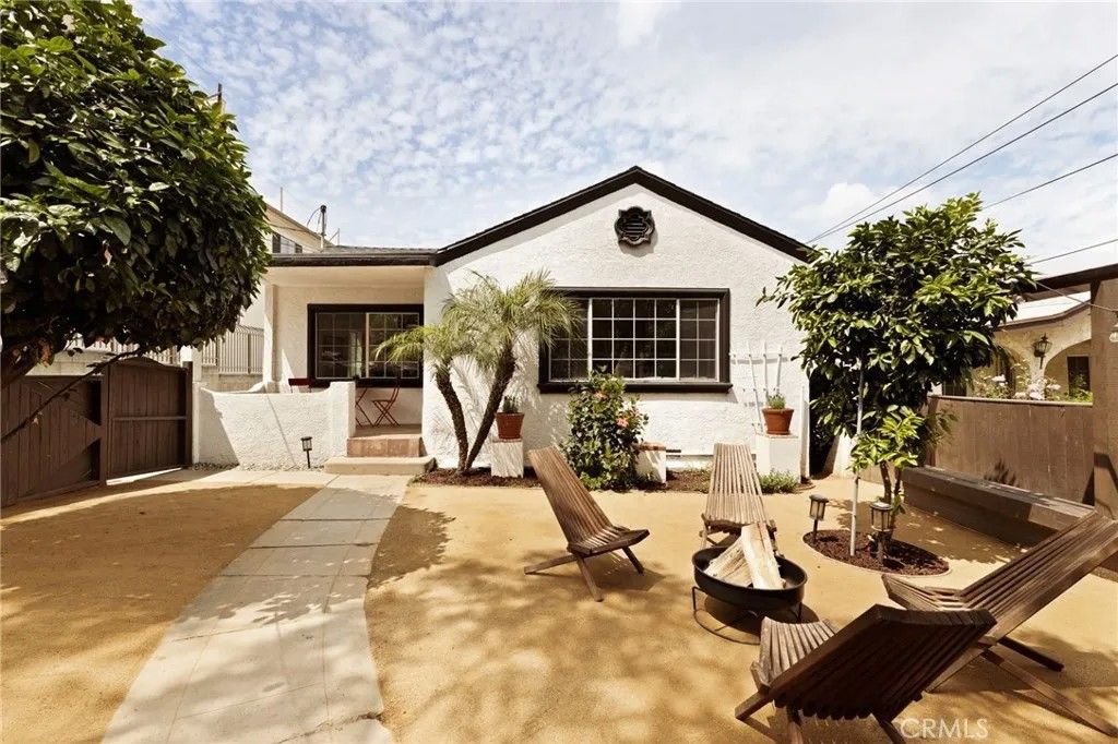 Photo of 1361 Armadale Avenue, Los Angeles, CA 90042 (MLS # AR26079988)