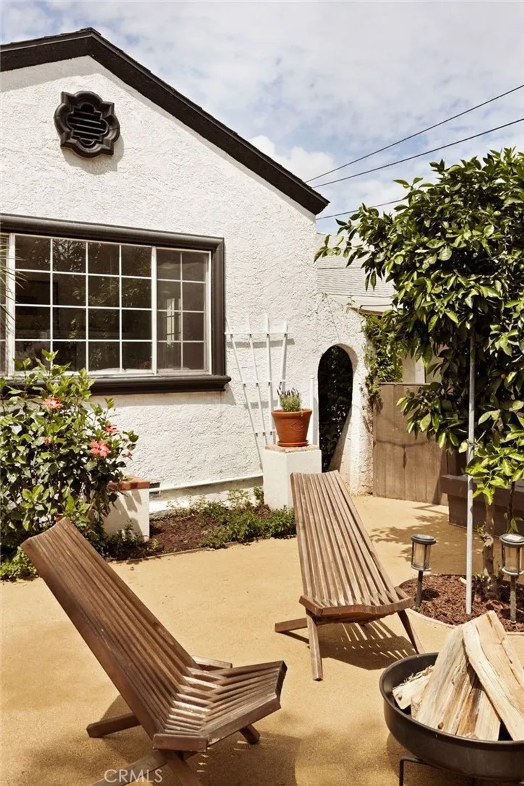 Photo of 1361 Armadale Avenue, Los Angeles, CA 90042 (MLS # AR26079988)