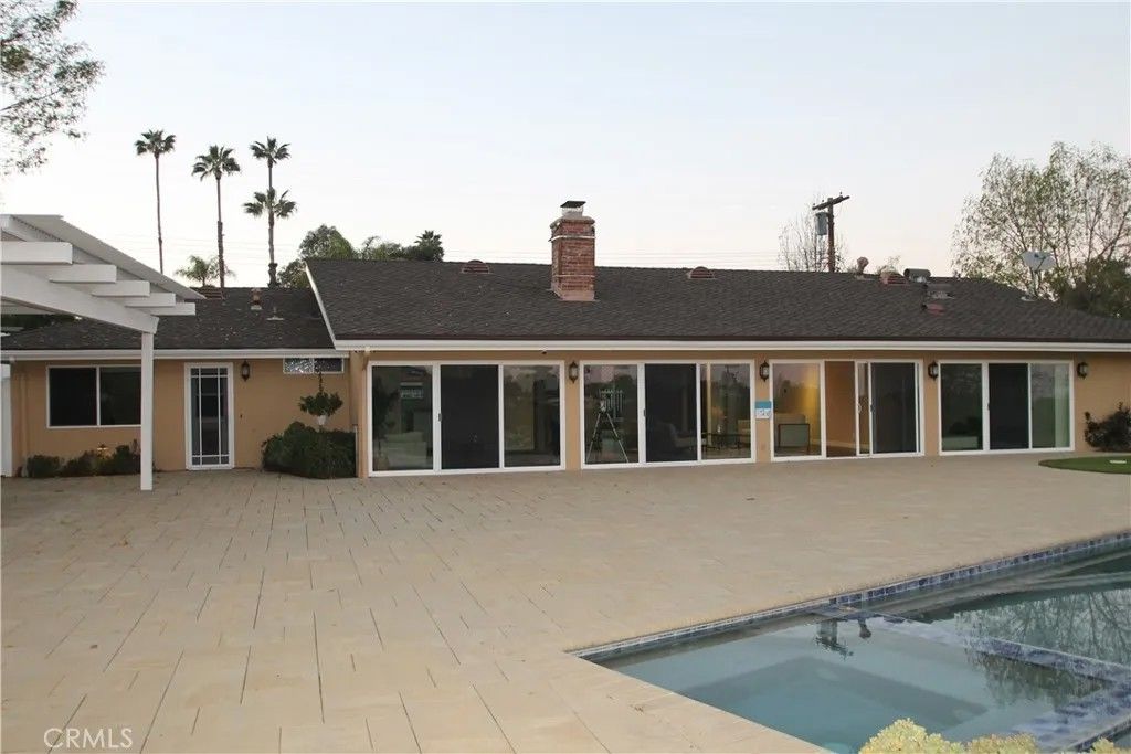 Photo of 20216 Delita Drive, Woodland Hills, CA 91364 (MLS # GD26017379)