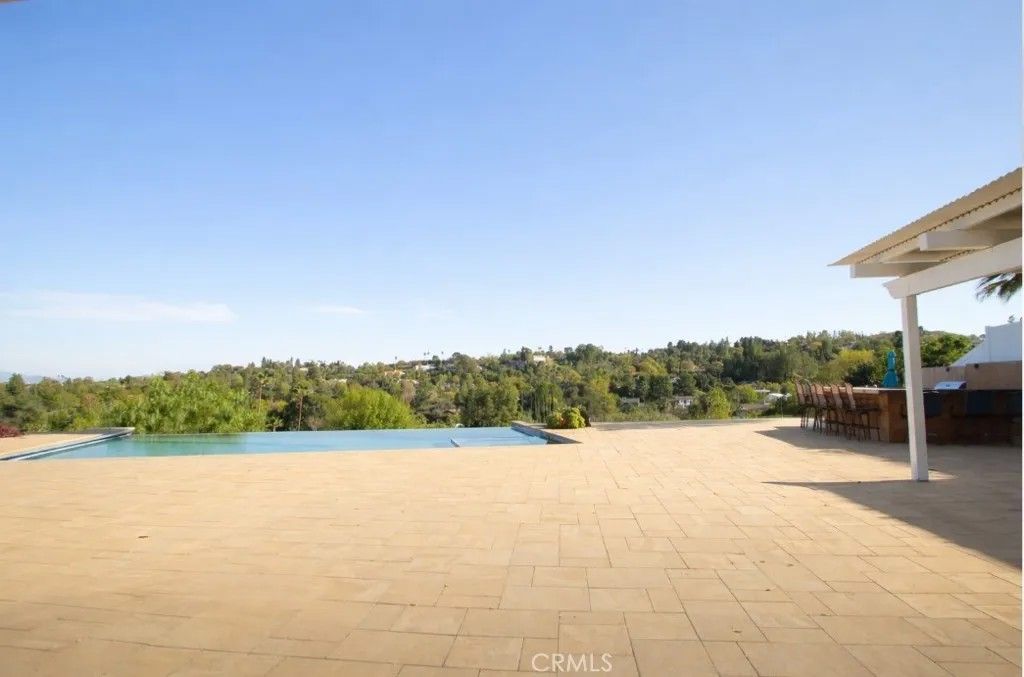 Photo of 20216 Delita Drive, Woodland Hills, CA 91364 (MLS # GD26017379)