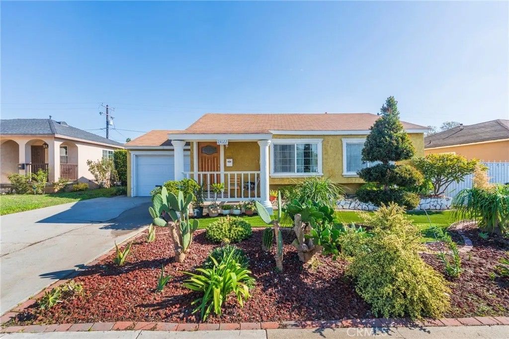 Photo of 13022 S Budlong Avenue, Gardena, CA 90247 (MLS # SB25267464)