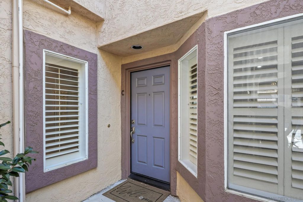 Photo of 11378 Via Rancho San Diego #C, El Cajon, CA 92019 (MLS # 250042956)