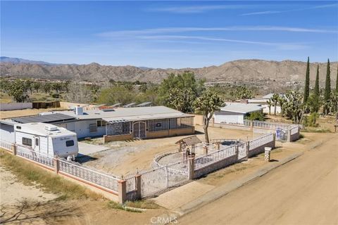 Photo of 8054 Palm Ave, Yucca Valley, CA 92284 (MLS # PW26060075)