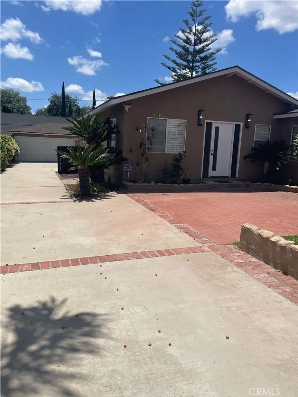 Photo of 408 E Elm Street, Brea, CA 92821 (MLS # PW26063133)