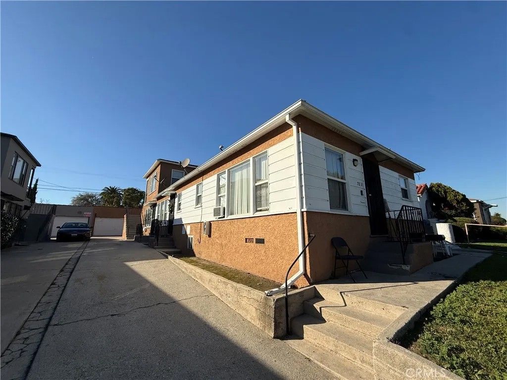 Photo of 7833 S Normandie Avenue #1/2, Los Angeles, CA 90044 (MLS # SB26017111)