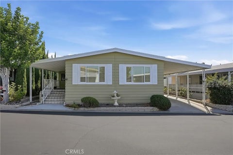 Photo of 24001 Muirlands BLVD #440, Lake Forest, CA 92630 (MLS # OC26214271)