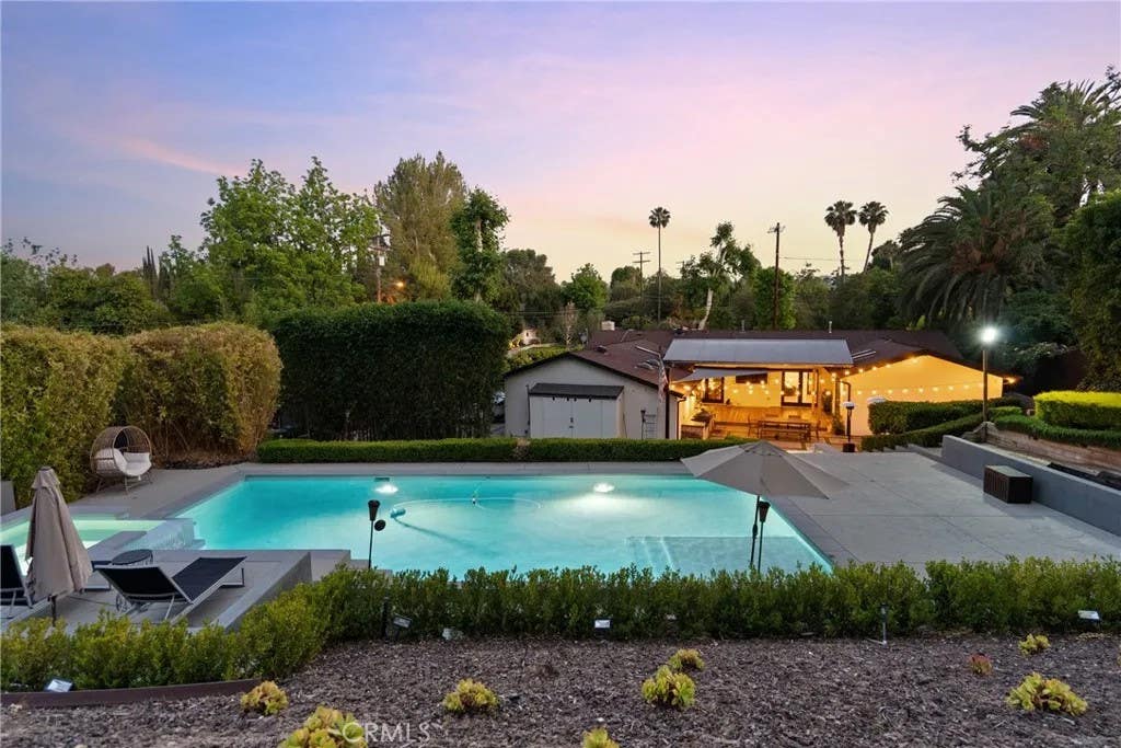 Photo of 6013 Lubao Avenue, Woodland Hills, CA 91367 (MLS # GD26181761)