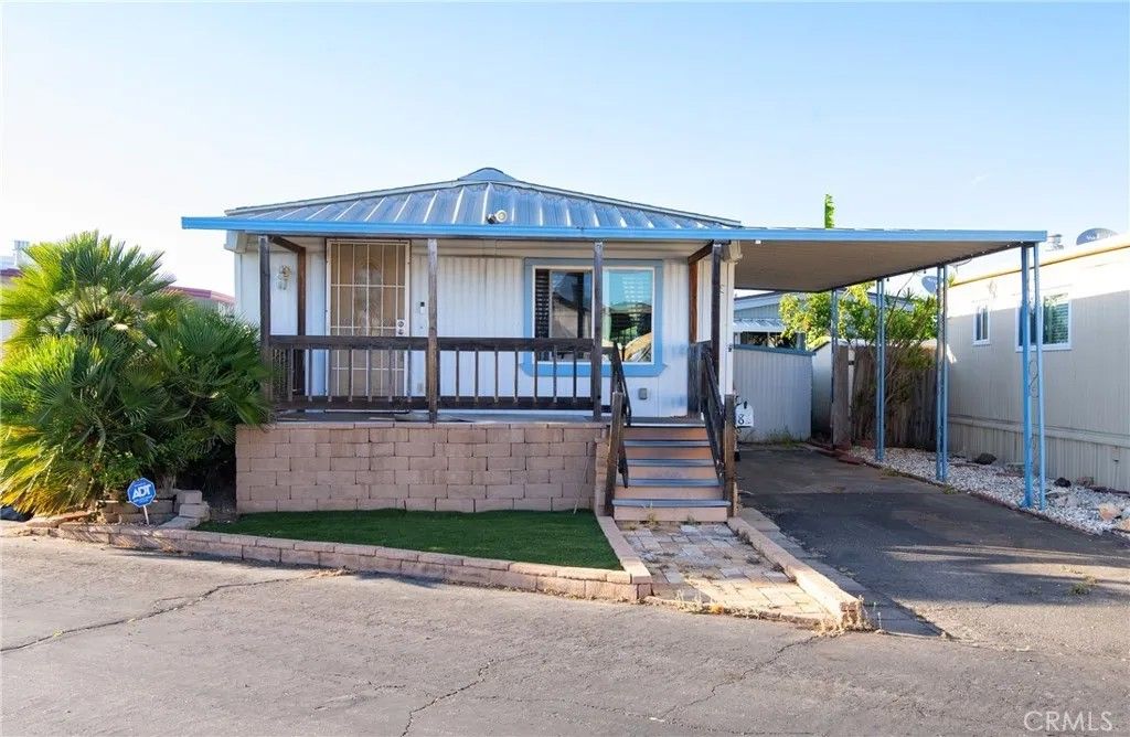 Photo of 24815 Normandie Ave #82, Harbor City, CA 90710 (MLS # DW26076163)