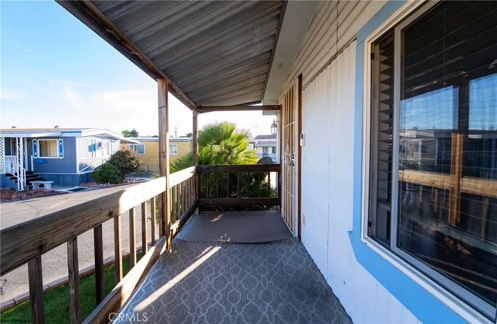 Photo of 24815 Normandie Ave #82, Harbor City, CA 90710 (MLS # DW26076163)