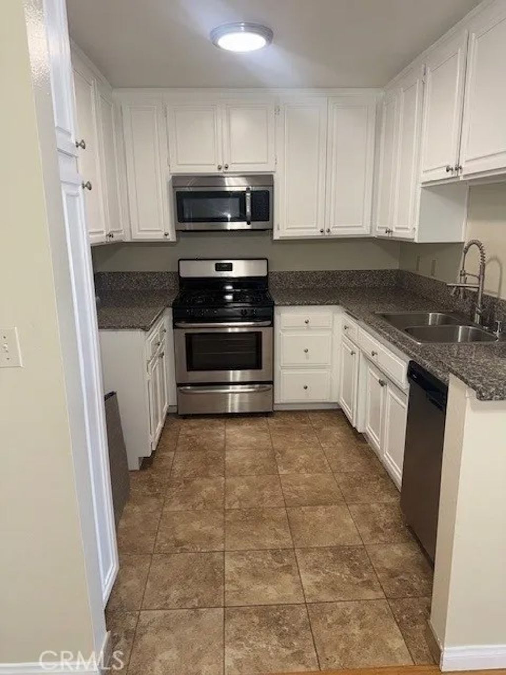 Photo of 1616 S Barrington Avenue #303, Los Angeles, CA 90025 (MLS # OC26086413)