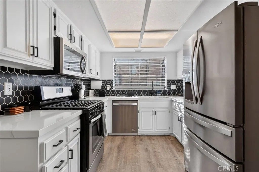 Photo of 433 W Avenue J5 #13, Lancaster, CA 93534 (MLS # OC26021236)