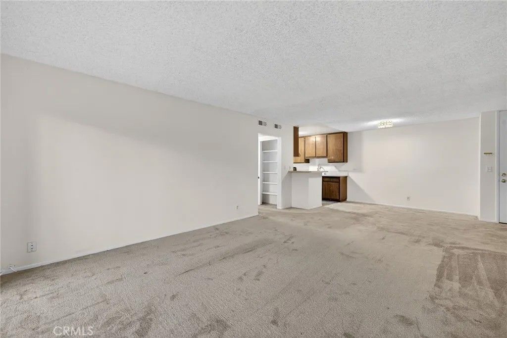 Photo of 576 N Bellflower Blvd #101, Long Beach, CA 90814 (MLS # NP26006438)