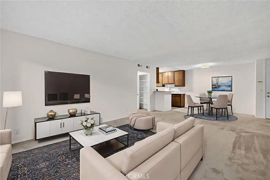 Photo of 576 N Bellflower Blvd #101, Long Beach, CA 90814 (MLS # NP26006438)