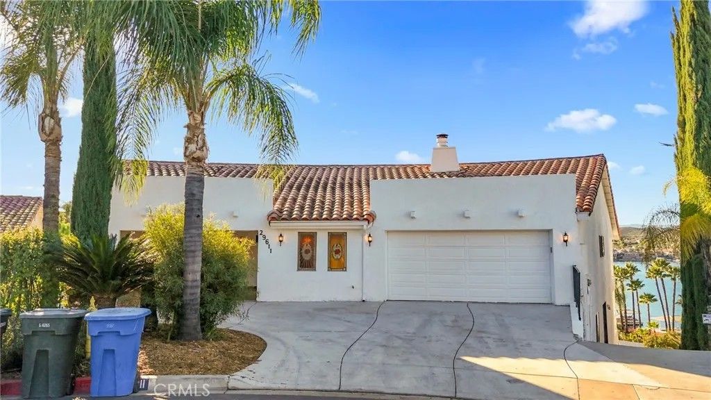 Photo of 29611 Bonanza Pl, Canyon Lake, CA 92587 (MLS # SW25278443)