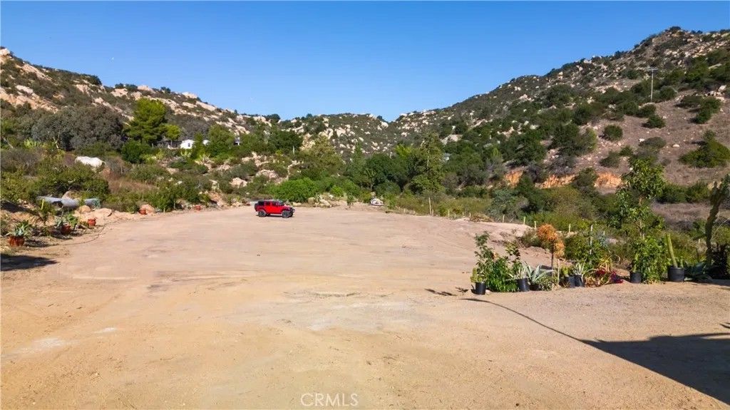 Photo of 5589 Rainbow Creek, Fallbrook, CA 92028 (MLS # OC24173449)