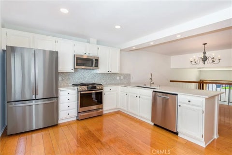 Photo of 18344 Collins Street #A, Tarzana, CA 91356 (MLS # SR26086794)