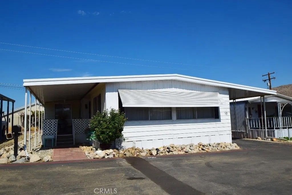 Photo of 7425 Church St #10, Yucca Valley, CA 92284 (MLS # JT26024938)