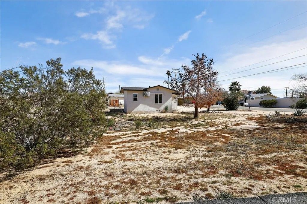 Photo of 73562 Desert trail Drive, 29 Palms, CA 92277 (MLS # SW26040515)
