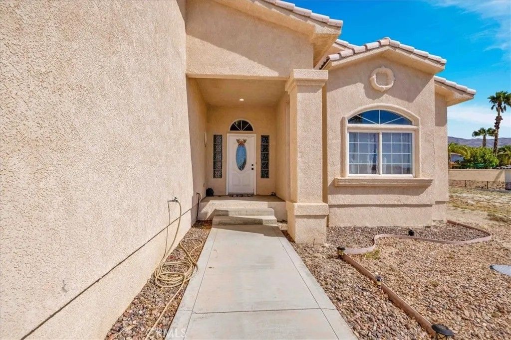 Photo of 64586 Brae Burn Avenue, Desert Hot Springs, CA 92240 (MLS # JT26040778)
