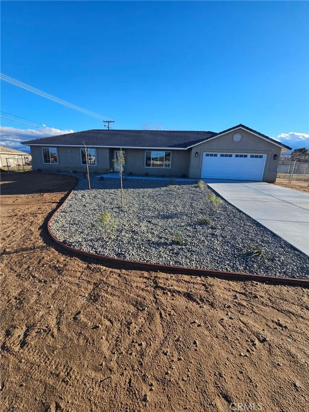 Photo of 20495 Zuni Road, Apple Valley, CA 92307 (MLS # HD26033380)