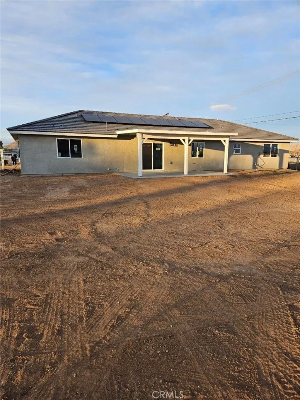 Photo of 20495 Zuni Road, Apple Valley, CA 92307 (MLS # HD26033380)